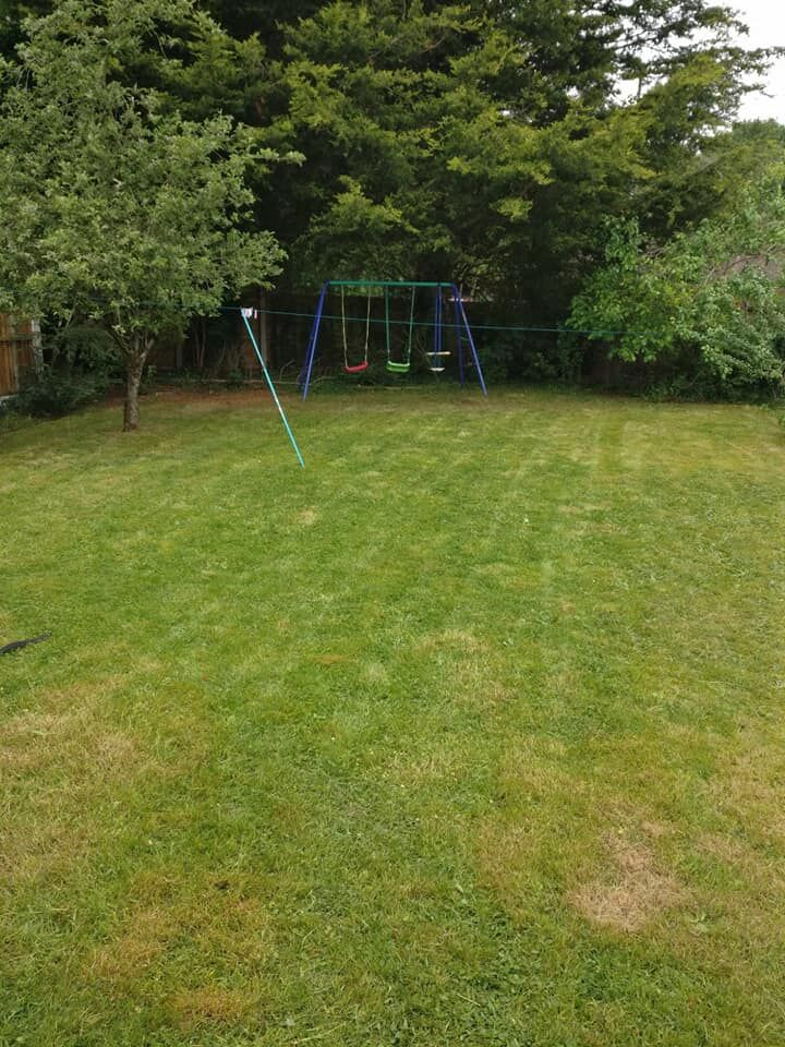 After: A family garden brought back to a lawn the children can use again.